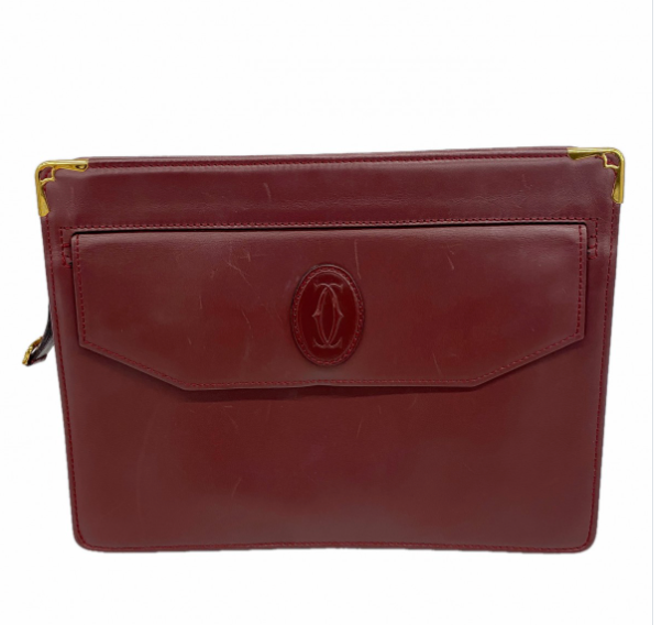Pochette Cartier Must cuir bordeaux, ferrures dorées