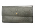 Portefeuille trois volets Louis Vuitton Monogram Mat Porte-Trésor International noir